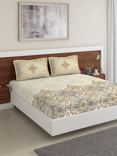 https://cdn.shopify.com/s/files/1/1857/6931/products/e1623e72-f674-4a6b-975c-49c3800ff90e1644433043634DDecorBeigeGreyEthnicMotifs180TCCotton1KingBedsheetwith2Pill1.jpg?v=1703244577